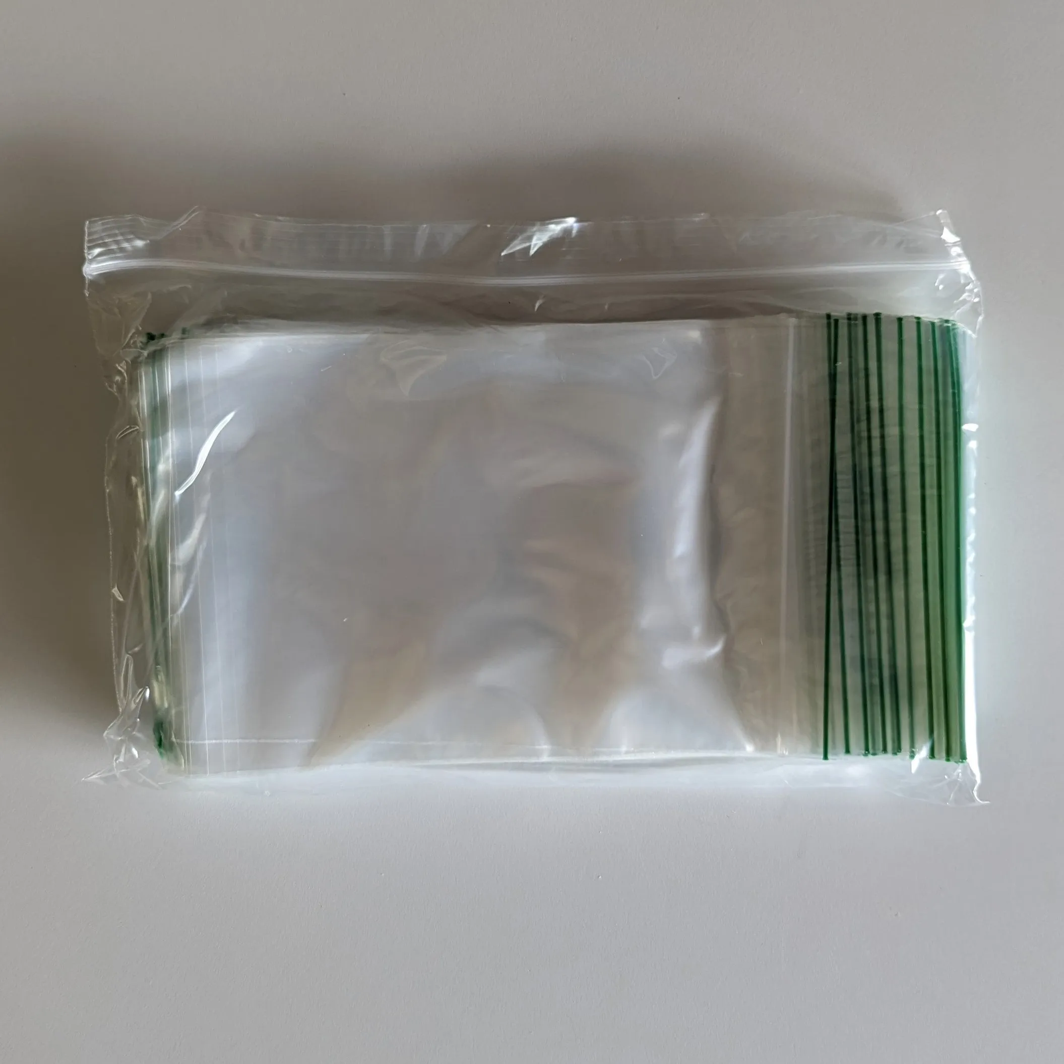 5" x 7" x 2 mil Pint Size Clear Landfill-Biodegradable Plastic Ziplock Bags with Resealable Zipper, Green Line (1,000 Bags, 100 Bags/Pack, 10 Packs/Case)